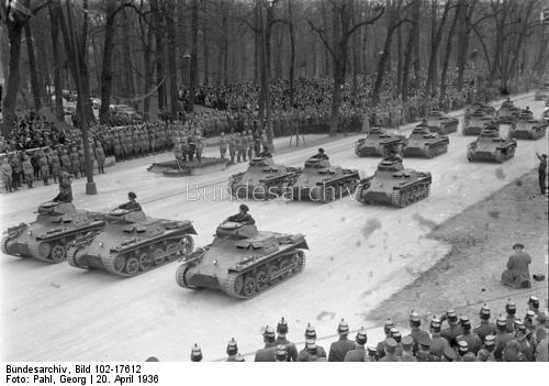 Adolf Hitler saluting a parade of Panzer I tanks in front of the Technical University in Berlin on the occasion of his birthday